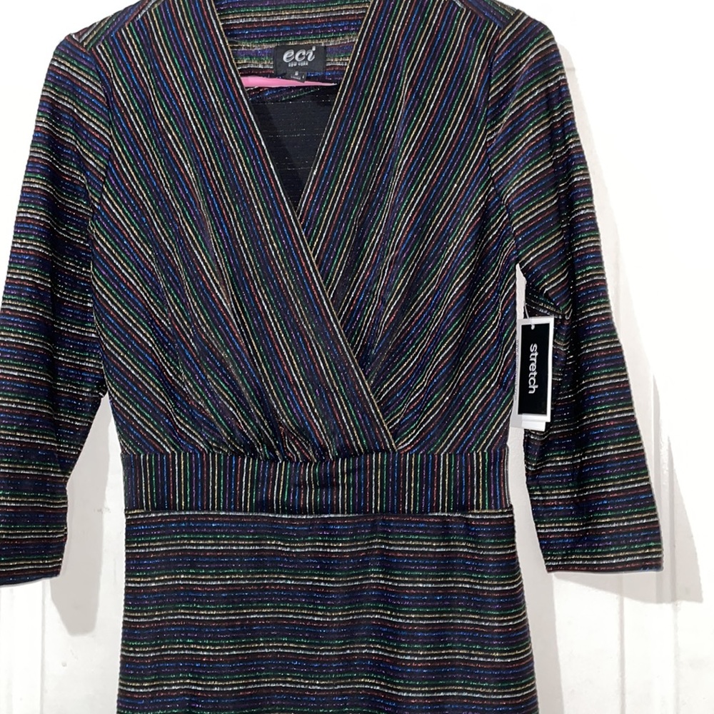 Very cute Eci NWT svelte dress. Small.